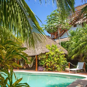 holbox-deluxe-apartments.quintano-roohotels.com/